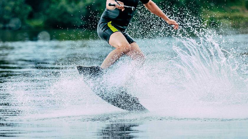 man jumping a wave on his wakeboard at Wakefest 2024