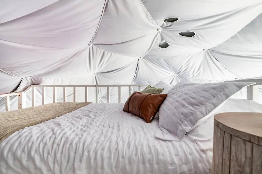 loft bed in a glamping dome