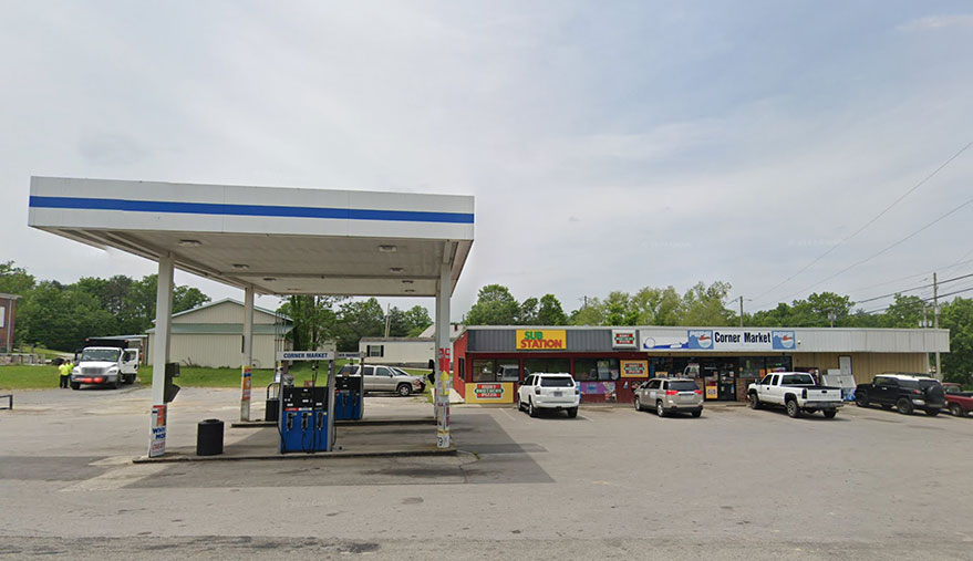 A small gas station with a 
